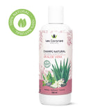 Bote de champú natural con aloe vera de 250 ml sobre fondo blanco